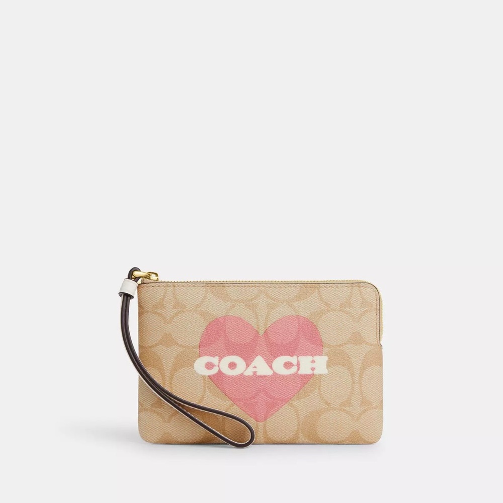 ‼️Still in a original package ‼️ Coach Corner Zip Wristlet With Heart Print